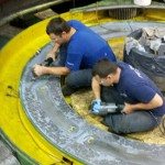 Two technician performing emergency field repair.