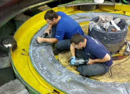 Two technician performing emergency field repair.