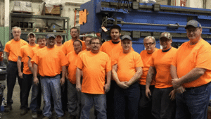 Staff wearing "Safety Begins With Me" shirts.